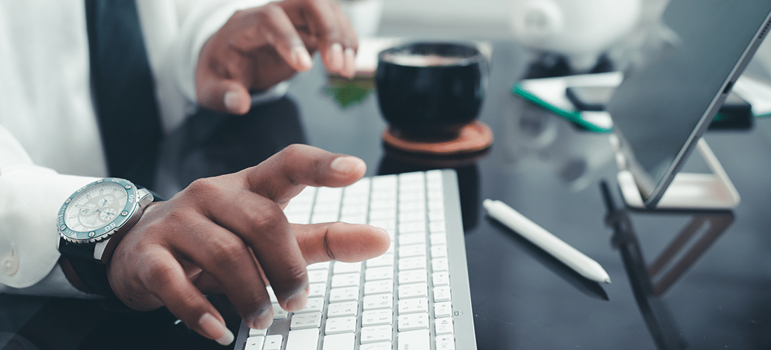 a man at a desk points to something that inspires him