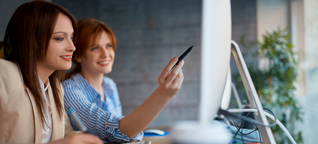 a client and a designer discuss a website project