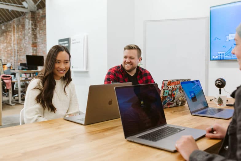 a man and a woman collaborate on a project