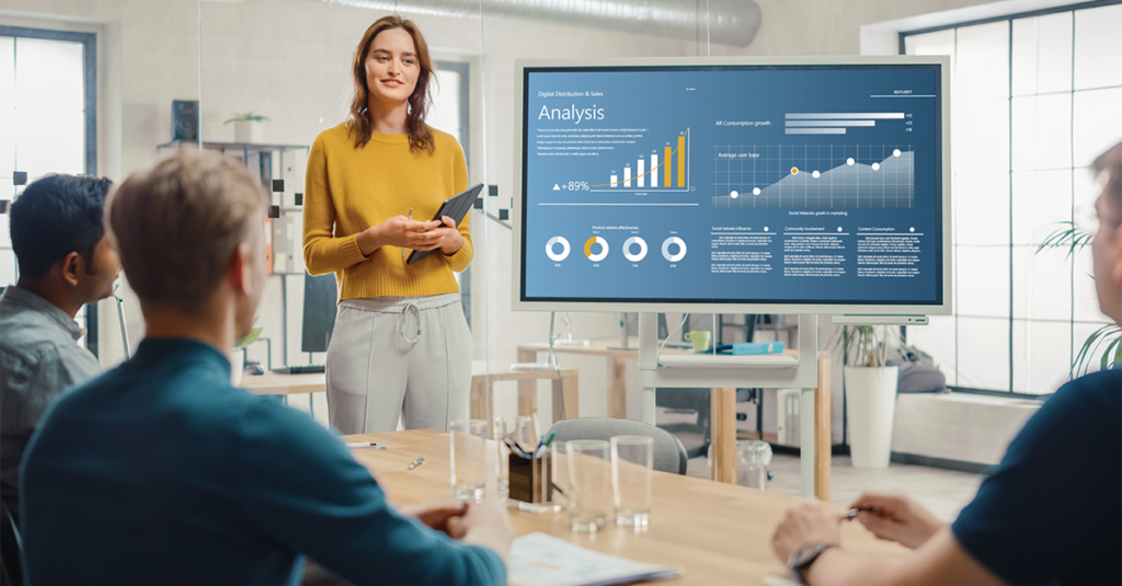 A WooCommerce specialist present a technical analytics reports to her colleagues