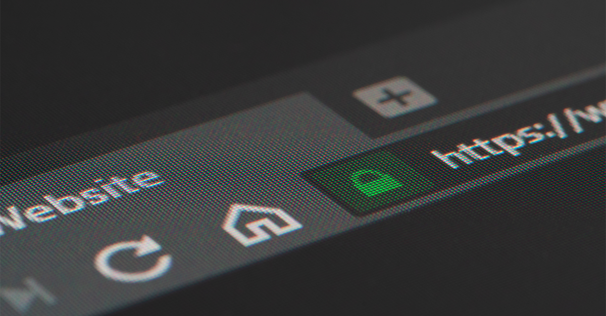 Web browser closeup on LCD screen with shallow focus on https padlock.